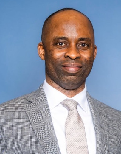 Dr. Michael Koku